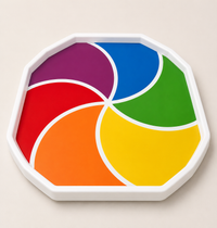 Rainbow Swirl Tuff Tray Insert with six bright colours swirling out from the centre for colourful sensory play