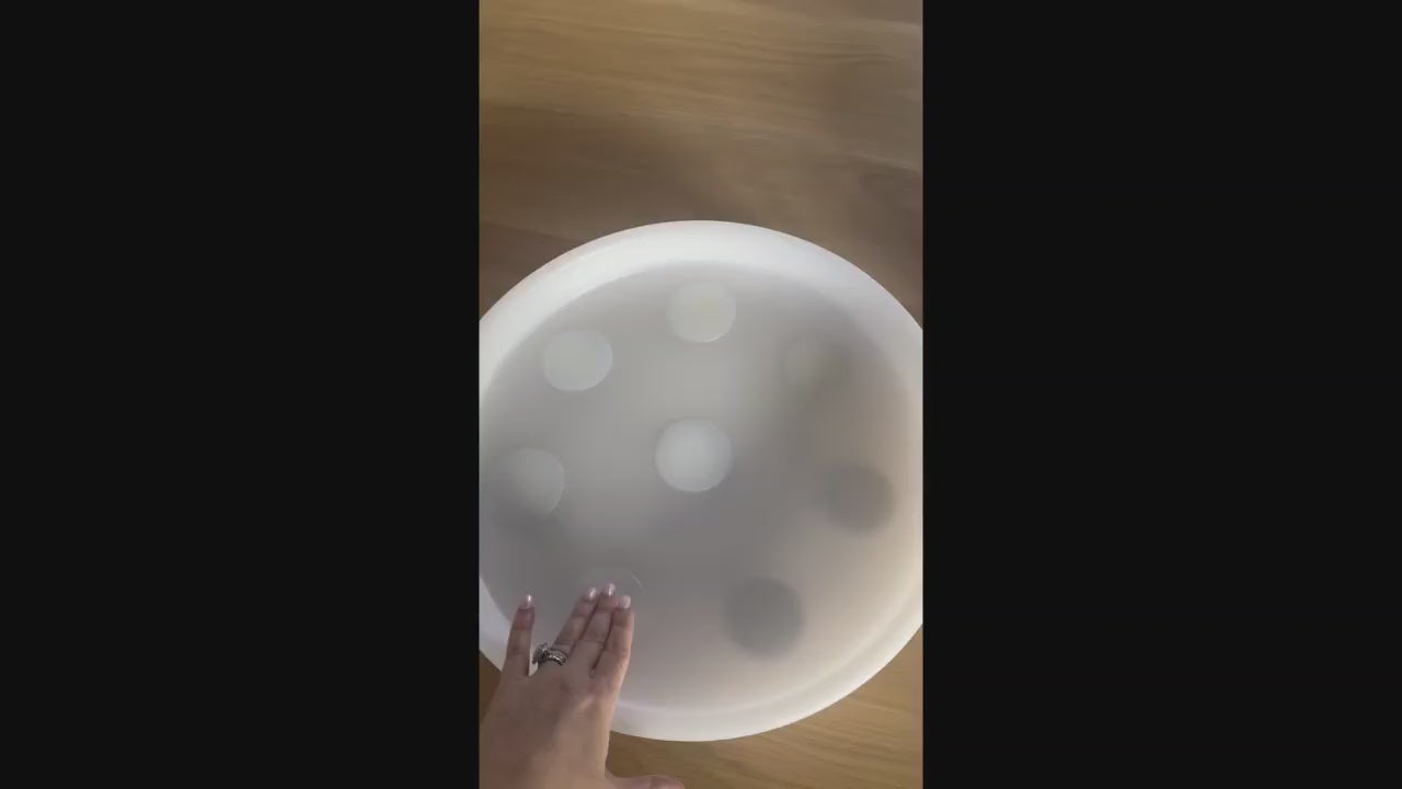 Video of the Tabletop Sensory Light Play domes changing colour as a child presses them