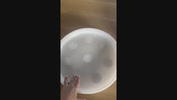 Video of the Tabletop Sensory Light Play domes changing colour as a child presses them